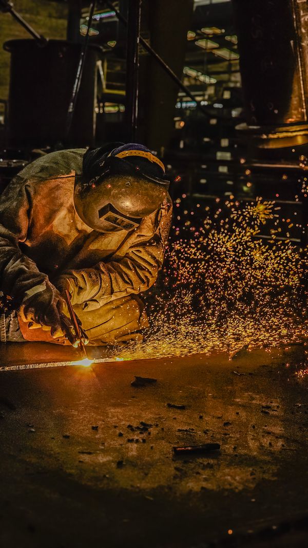 Sparks flying during custom exhaust fabrication